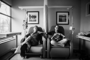 Howie calls these “his and hers” chairs. He sits beside Laurel, his wife of thirty-four years, as they get their weekly chemotherapy treatments, side by side at Oncologist Dr. Barry Boyd’s office. Greenwich, Connecticut. January, 2013. © Nancy Borowick